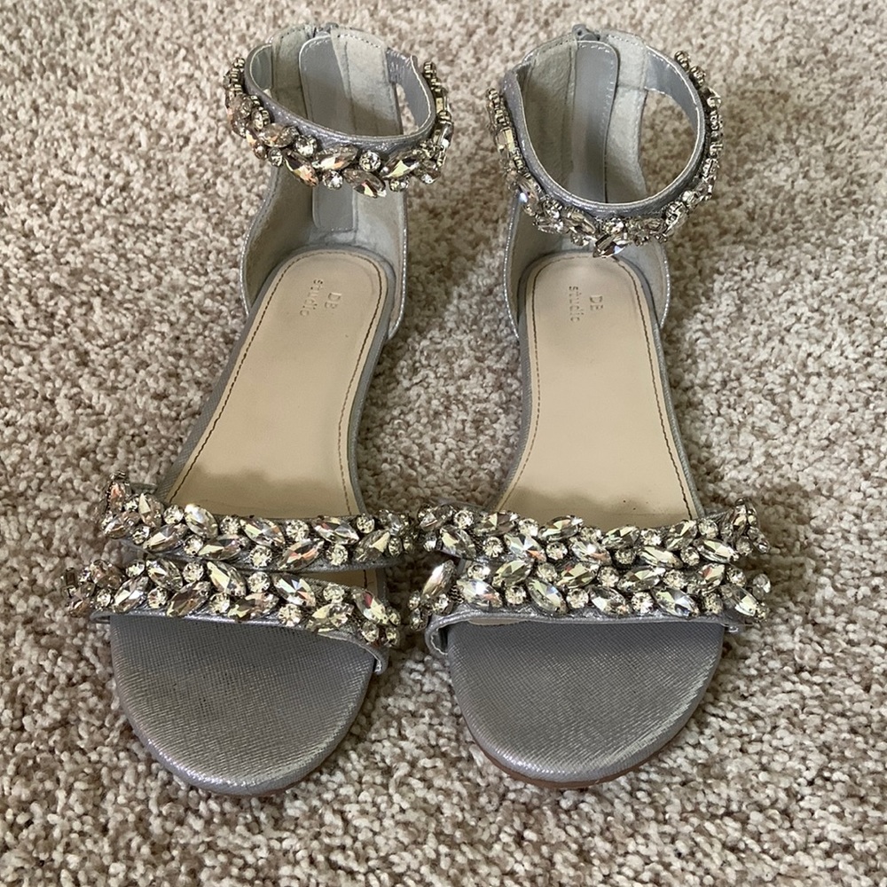 Women’s flat bejeweled zip up back sandal. Wore once for wedding. Women’s size 6